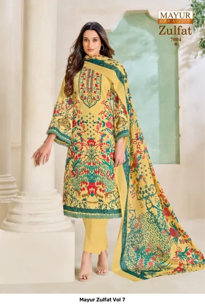 Mayur Zulfat Vol 7 yellow salwar suit featuring floral prints, solid trousers, and an intricately printed matching dupatta.