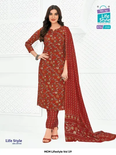 MCM Lifestyle Vol 19 rust orange floral printed cotton salwar suit with a matching printed dupatta and striped trousers.