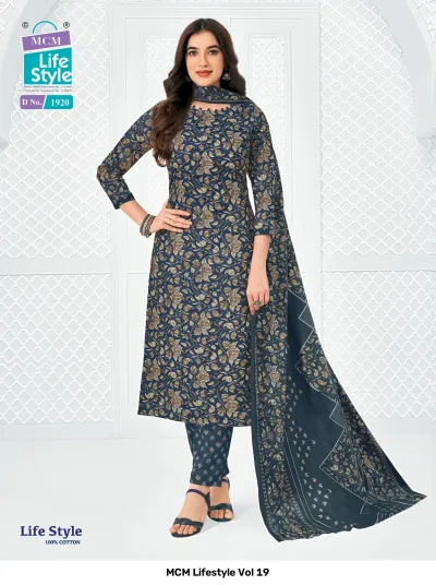 MCM Lifestyle Vol 19 navy blue floral printed cotton salwar suit with a matching dupatta and patterned trousers.