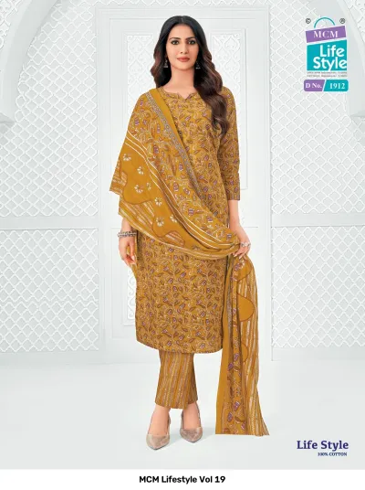 MCM Lifestyle Vol 19 mustard yellow printed cotton salwar suit with a patterned dupatta and striped trousers.
