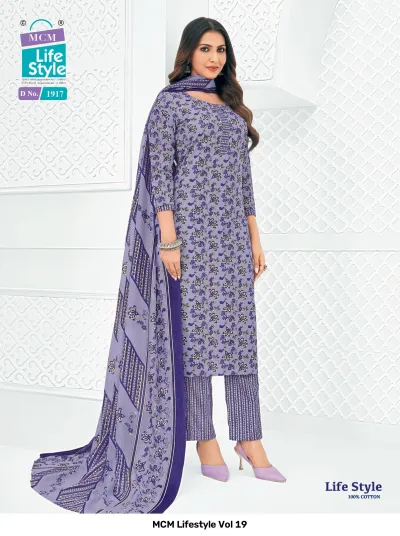 MCM Lifestyle Vol 19 purple floral printed cotton salwar suit with a matching dupatta and striped trousers.