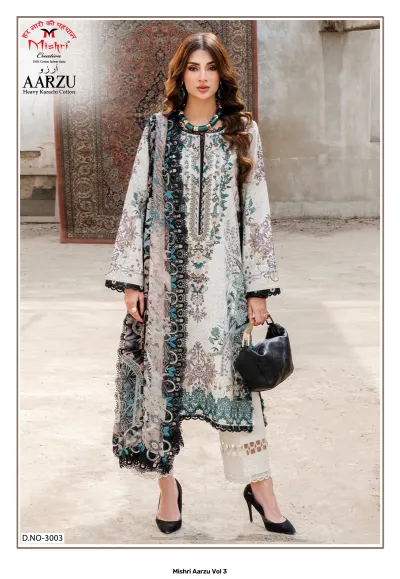 Mishri Aarzu Vol 3: Off-white and black printed cotton salwar suit with floral patterns, lace detailing, and a matching printed dupatta.