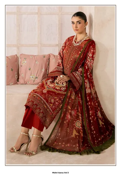 Mishri Aarzu Vol 3: Red printed cotton salwar suit with floral patterns and intricate embroidery on the neckline, paired with a matching dupatta.