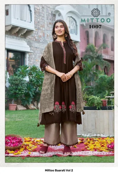 Mittoo Baarati Vol 2: Brown kurti with pink floral print, embroidery, and beige palazzo pants with a printed dupatta.