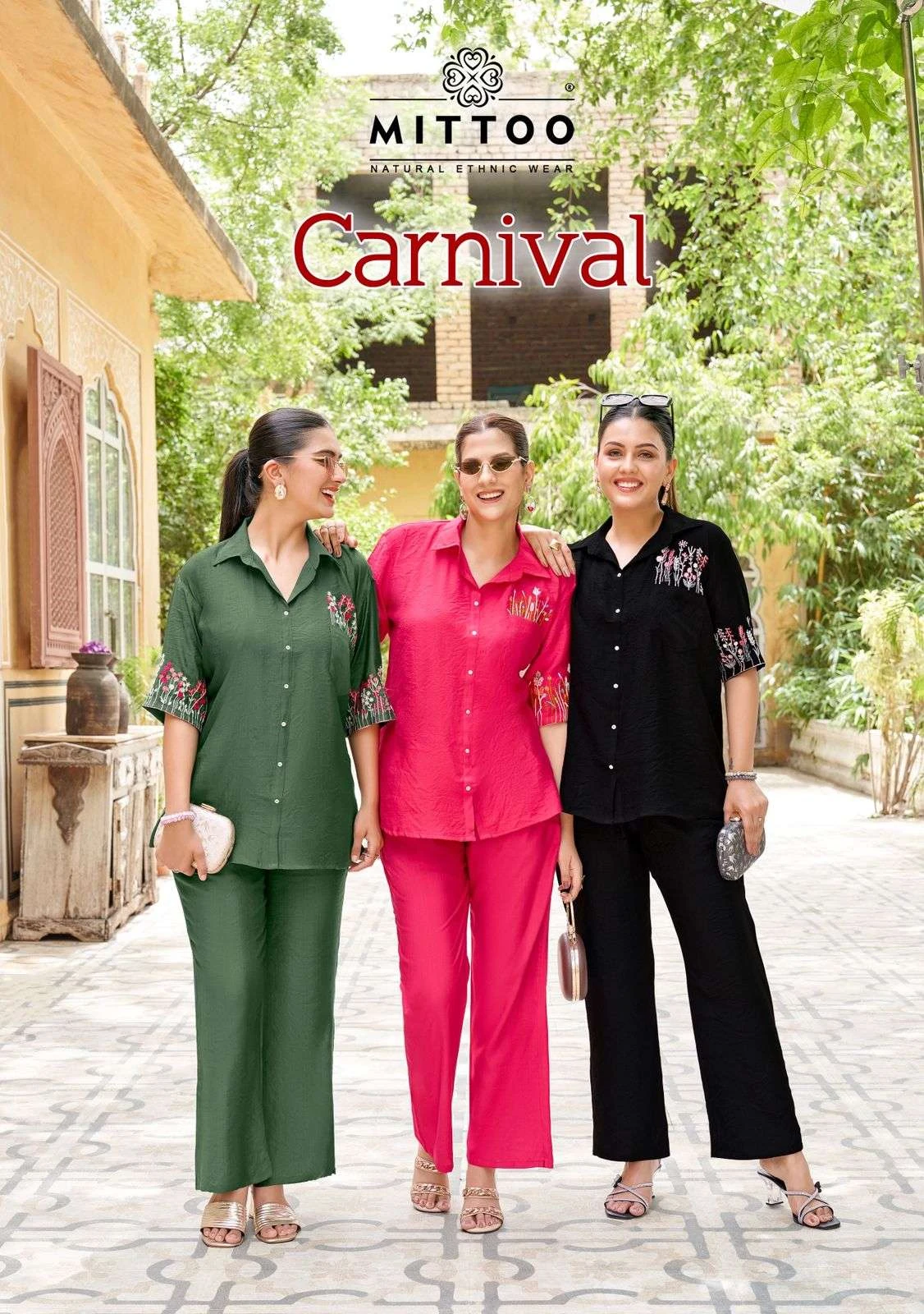Mittoo Carnival catalog cover featuring three models wearing button-down shirt and trouser sets with floral thread embroidery on the pocket and sleeves.