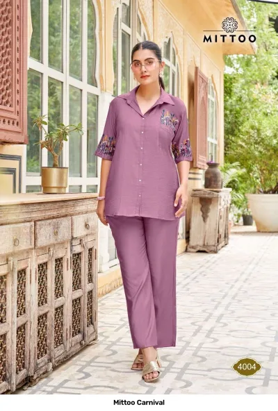 Mittoo Carnival 4004 mauve co-ord set featuring a button-down shirt and trousers with colorful floral thread embroidery on the pocket and sleeves.