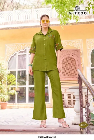 Mittoo Carnival 4001 olive green co-ord set with a button-down shirt and straight trousers, featuring floral thread embroidery on the pocket and sleeves.