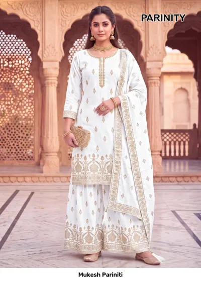 Mukesh Pariniti off-white salwar suit with gold printed patterns on a kurta, sharara pants, and dupatta with gold zari highlights.