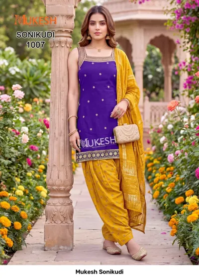 Mukesh Sonikudi 1007, purple kurti with gold thread embroidery, paired with a yellow printed salwar and matching dupatta.
