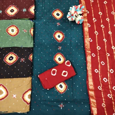 Nemi Satin 4 Design Work: A display of dress material sets in teal, maroon, olive, black, and beige, featuring printed bandhani and striped patterns.
