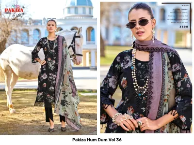 Pakiza Hum Dum Vol 36: A woman in a black floral printed salwar suit with a matching dupatta and pearl jewelry.