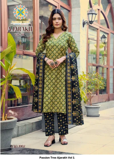 Passion Tree Ajarakh Vol 1 green printed cotton salwar suit with geometric patterns, black patterned trousers, and a border-detailed dupatta.