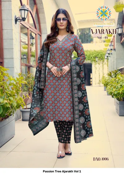 Passion Tree Ajarakh Vol 1 red and blue printed cotton salwar suit with geometric patterns, straight cut kurti, and dark trousers.