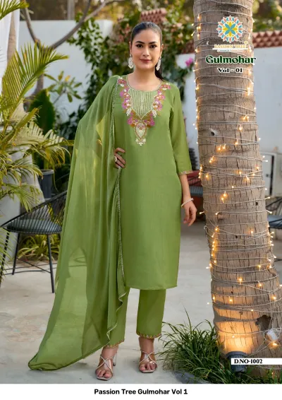 Passion Tree Gulmohar Vol 1: Olive green salwar suit with floral thread work embroidery on the neckline, matching pants, and a plain dupatta.