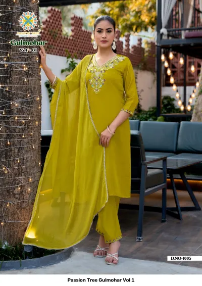 Passion Tree Gulmohar Vol 1: Olive green salwar suit featuring detailed floral thread work on the neck, matching pants, and a plain dupatta.
