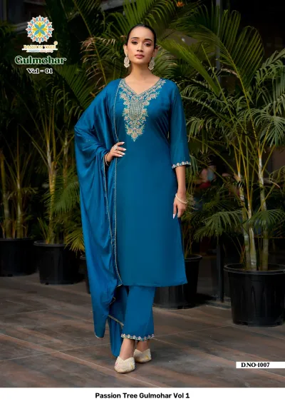 Passion Tree Gulmohar Vol 1: Deep blue salwar suit featuring delicate floral thread work on the neckline, matching pants, and a matching dupatta.