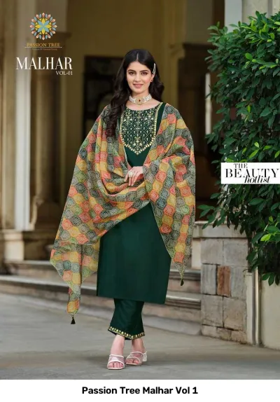 Passion Tree Malhar Vol 1: Dark green salwar suit with embroidered yoke and hem, paired with a multi-colored geometric print dupatta.