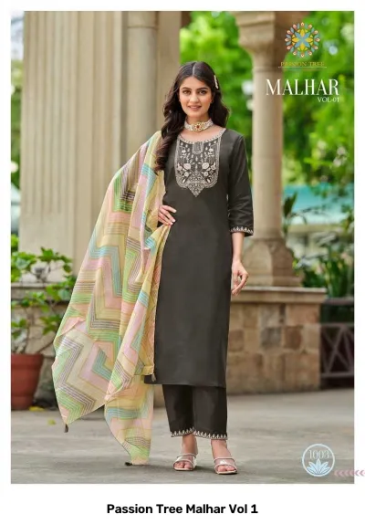 Passion Tree Malhar Vol 1: Dark grey salwar suit with floral thread work embroidery on the yoke and a multi-colored zigzag print dupatta.