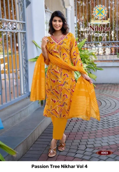 Passion Tree Nikhar Vol 4 mustard yellow printed salwar suit with leaf pattern, dupatta, and thread work detailing.