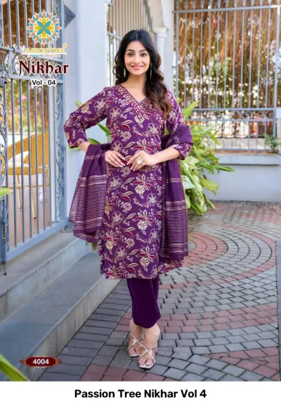 Passion Tree Nikhar Vol 4 purple salwar suit with floral print, matching dupatta, and intricate thread work on the neckline.
