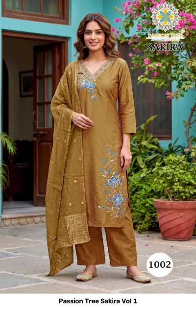Passion Tree Sakira Vol 1 brown salwar suit with blue floral thread work embroidery and a matching dupatta with a zari-woven border.