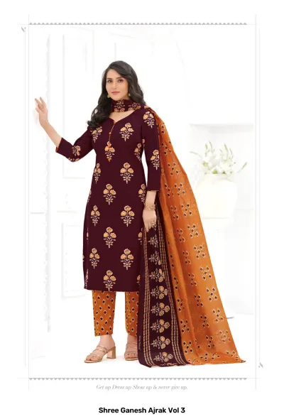 Shree Ganesh Ajrak Vol 3: maroon kurti and pant set with floral print and contrast ochre patterned dupatta.