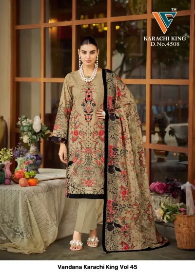 Vandana Karachi King Vol 45: beige cotton salwar suit with intricate floral prints in red and black, paired with a matching dupatta.