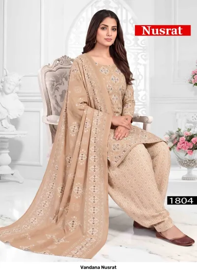 Vandana Nusrat 1804, beige cotton salwar suit with all-over geometric and floral print and matching dupatta.