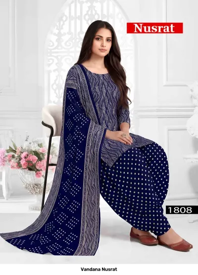 Vandana Nusrat 1808, navy blue cotton salwar suit featuring a white polka-dot and leaf printed pattern.
