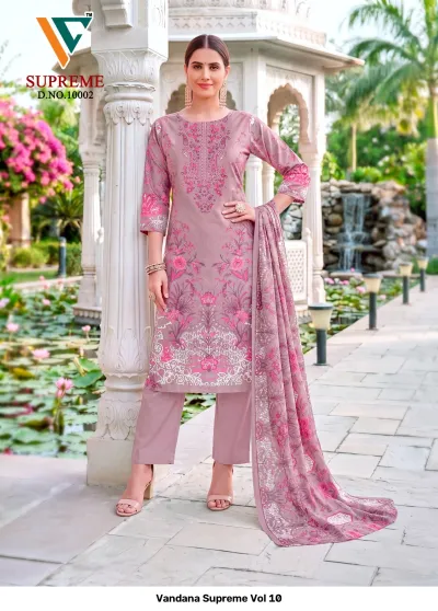 Vandana Supreme Vol 10: Mauve cotton salwar suit with pink floral prints, matching trousers, and a coordinating printed dupatta, featuring front thread embroidery.