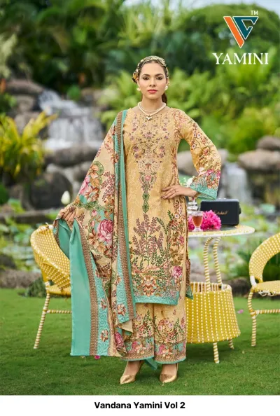 Vandana Yamini Vol 2, mustard yellow salwar suit with all-over floral print, embroidered neckline, and matching wide-leg trousers.