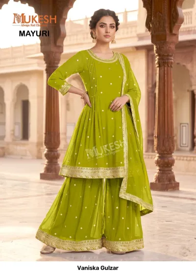 Vaniska Gulzar: Lime green sharara salwar suit with gold sequin accents and detailed zari work trim.