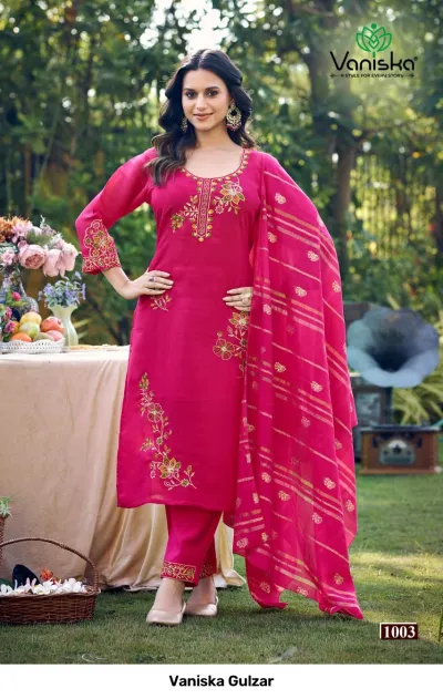 Vaniska Gulzar: Pink salwar suit with floral thread work embroidery, paired with straight trousers and a gold striped zari dupatta.