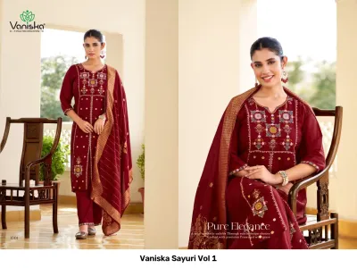 Vaniska Sayuri Vol 1, maroon salwar suit with thread work embroidery and a zari work dupatta.