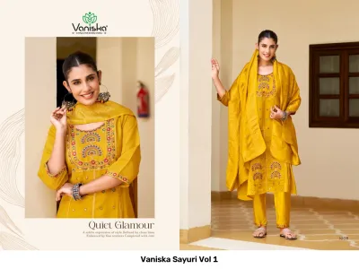 Vaniska Sayuri Vol 1, mustard yellow salwar suit with embroidered detailing and a plain dupatta.