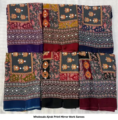 Wholesale Ajrak Print Mirror Work Sarees: Grey-based printed sarees with paisley and geometric motifs and mirror work.