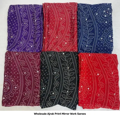 Wholesale Ajrak Print Mirror Work Sarees: Multicolored printed sarees with Bandhani-style dots and mirror work accents.