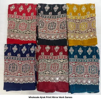 Wholesale Ajrak Print Mirror Work Sarees: Multicolored printed sarees with large ornamental motifs and mirror work borders.
