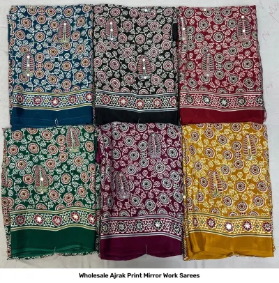 Wholesale Ajrak Print Mirror Work Sarees: Multicolored printed sarees with circular paisley patterns and mirror work.
