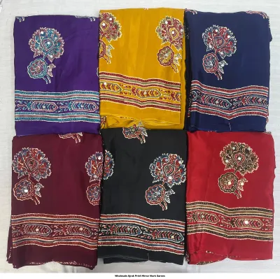 Wholesale Ajrak Print Mirror Work Sarees: Multicolored printed sarees with central floral motifs and mirror work borders.