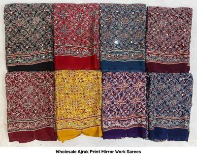 Wholesale Ajrak Print Mirror Work Sarees: Multicolored printed sarees with large floral motifs and mirror work borders.