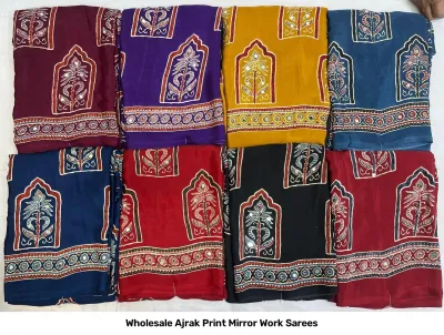 Wholesale Ajrak Print Mirror Work Sarees: Multicolored printed sarees with complex geometric star patterns and mirror work.