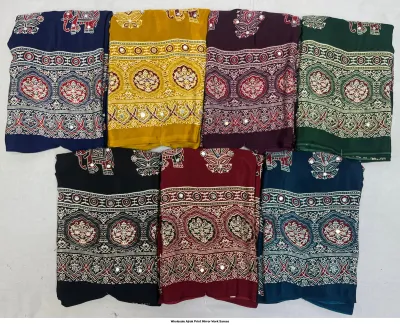 Wholesale Ajrak Print Mirror Work Sarees: Multicolored printed sarees featuring elephant motifs and mirror work detail.