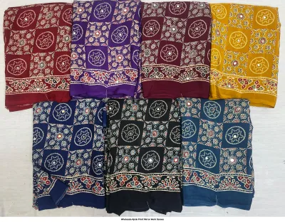 Wholesale Ajrak Print Mirror Work Sarees: Multicolored printed sarees with star motifs and mirror work borders.
