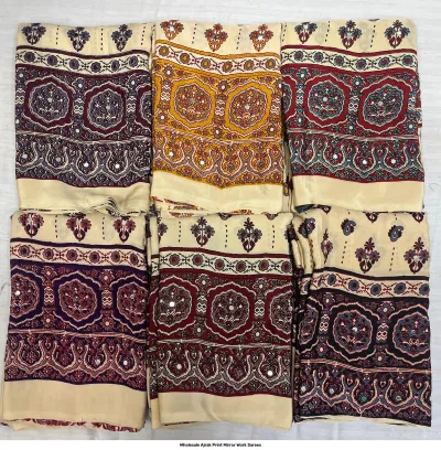 Wholesale Ajrak Print Mirror Work Sarees: Multicolored printed sarees with large mandala-style circular motifs and mirror work.
