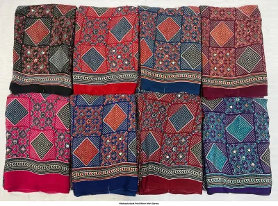 Wholesale Ajrak Print Mirror Work Sarees: Multicolored printed sarees with geometric-floral patterns and mirror work.