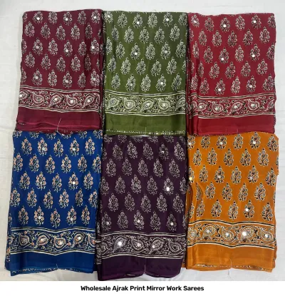 Wholesale Ajrak Print Mirror Work Sarees: Multicolored printed sarees with large peacock motifs and mirror work.