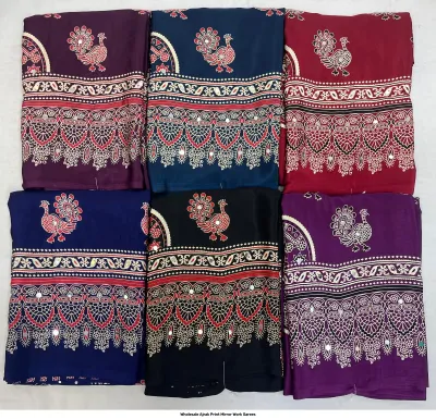 Wholesale Ajrak Print Mirror Work Sarees: Multicolored printed sarees with sparse dot patterns and mirror work.