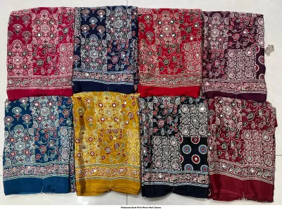 Wholesale Ajrak Print Mirror Work Sarees: Multicolored patchwork-style printed sarees with mirror work embellishments.