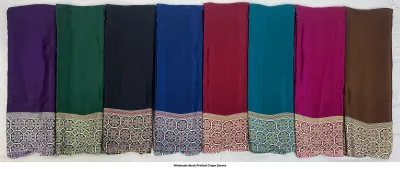 Wholesale Ajrak Printed Crepe Sarees: Six colorful sarees with repetitive circular and geometric Ajrak patterns.